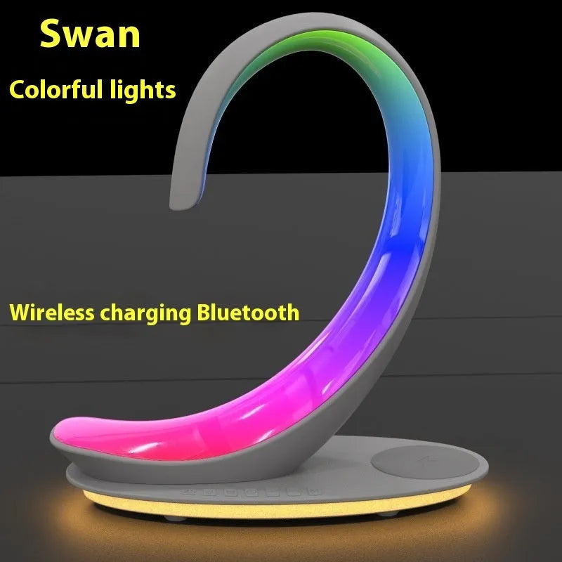 White Swan animal sculpture desktop wireless charger with Bluetooth speaker and colourful LED mood lighting