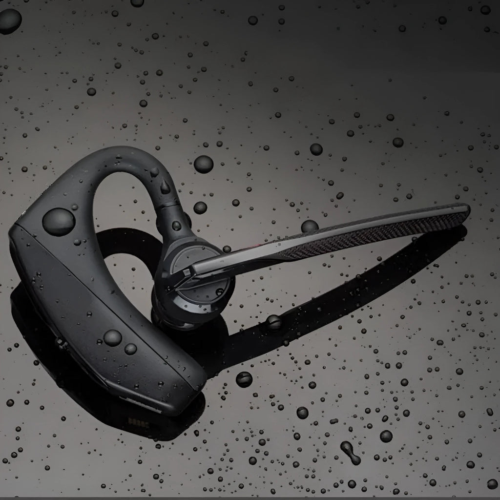 Black stereo Bluetooth sports headphones with a simple plastic design on a white background.