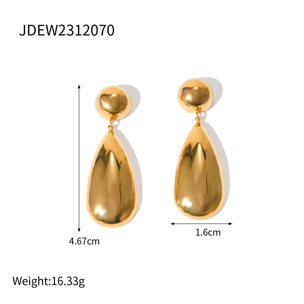 A pair of gold-coloured stainless steel earrings with a geometric water drop and hemisphere pendant design.