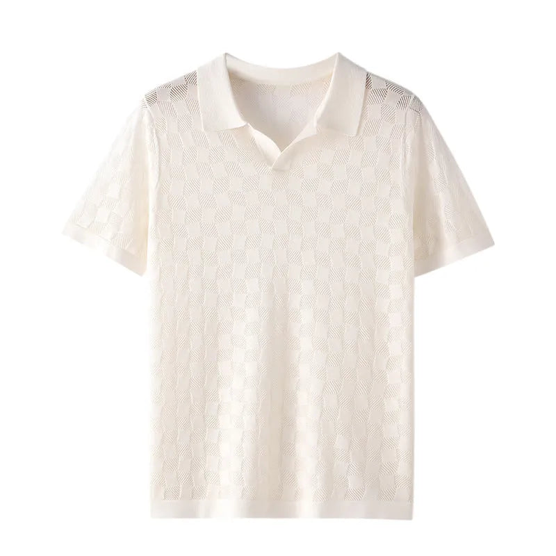 Man wearing a camel-coloured short sleeve sweater with a lapel collar, made from mulberry silk jacquard fabric.