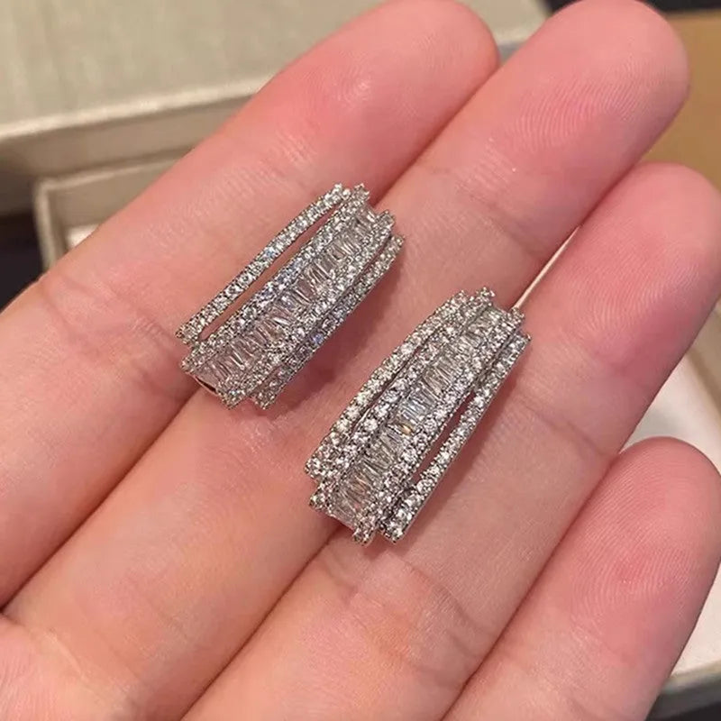 Geometric copper stud earrings with white gold finish and zircon stone decoration