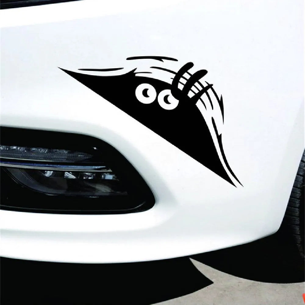 Large black smiley face self adhesive body sticker measuring 19cm by 7cm on skin