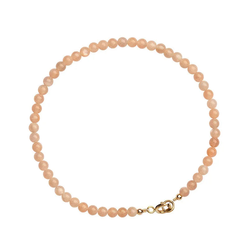 Sunstone crystal fortune bracelet with 3mm ultra-thin beads on female wrist