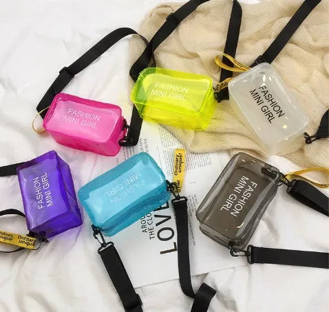 Transparent square jelly shoulder bag in multiple colours with an adjustable long strap.