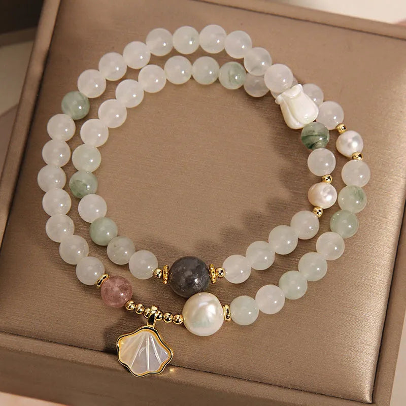 Tianshan Emerald Green Crystal Bracelet with apricot leaf pendant and gold-plated gemstone details