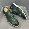Men's low-top handmade shoes with an embossed pattern and front tie laces.