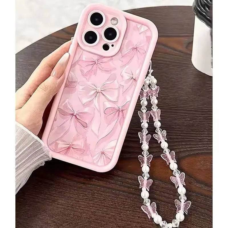 Pink matte silicone phone case with bow for iPhone 16
