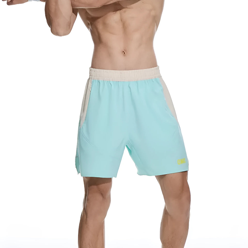 Men's loose grey Hipp workout lifting shorts with elastic lace-up fly on a plain background.