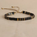 Geometric pull bead bracelet with glass and coloured glaze beads in round design