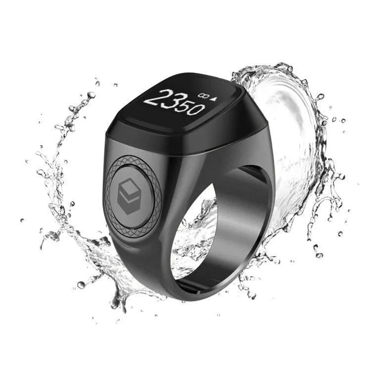 Zikr1 metal smart ring showing OLED display, available in black, green, rose gold, and silver.