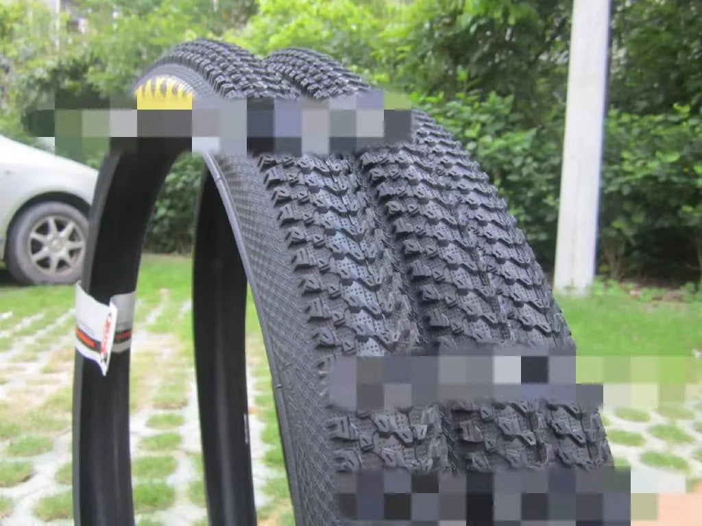 Mountain bike ultralight puncture proof tyre showing tread and sidewall, available in 26, 27.5, and 29-inch sizes.