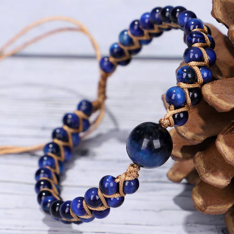 Hand-woven geometric pull bracelet with tigereye stone beads in blue or amethyst colour