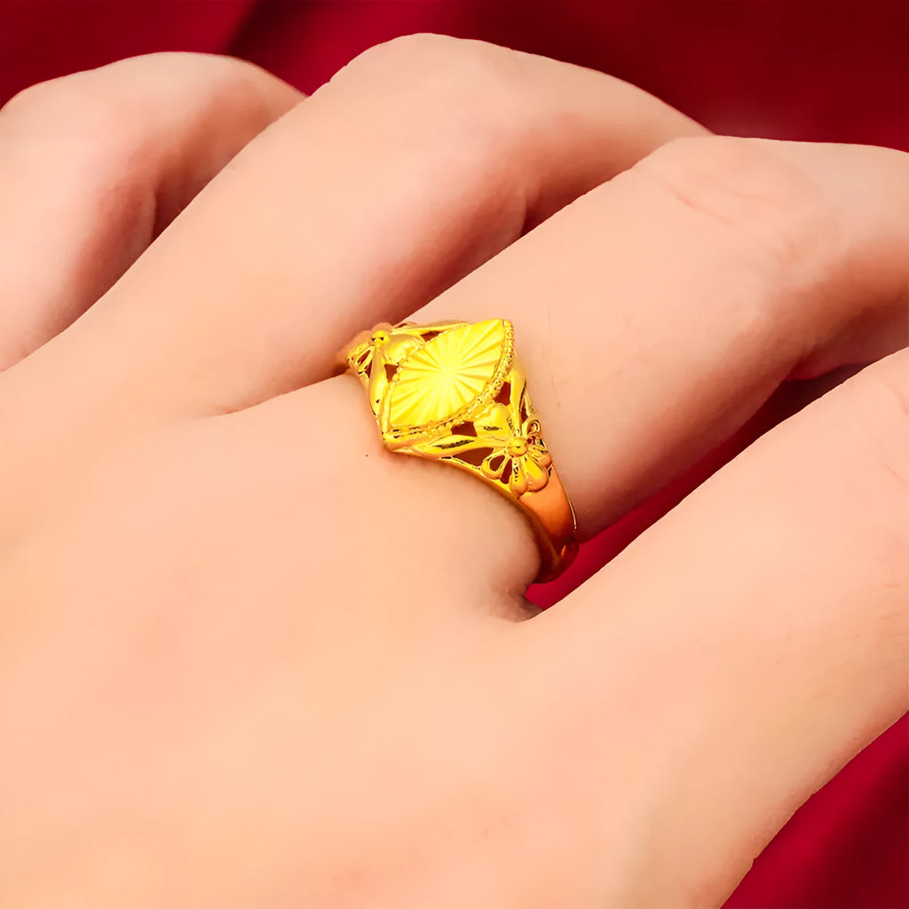 Gold electroplated brass ring with geometric open diamond flower design and textured surface