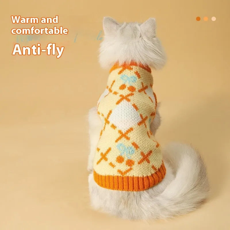 Orange cherry pattern cat sweater for autumn and winter wear with warm windproof design