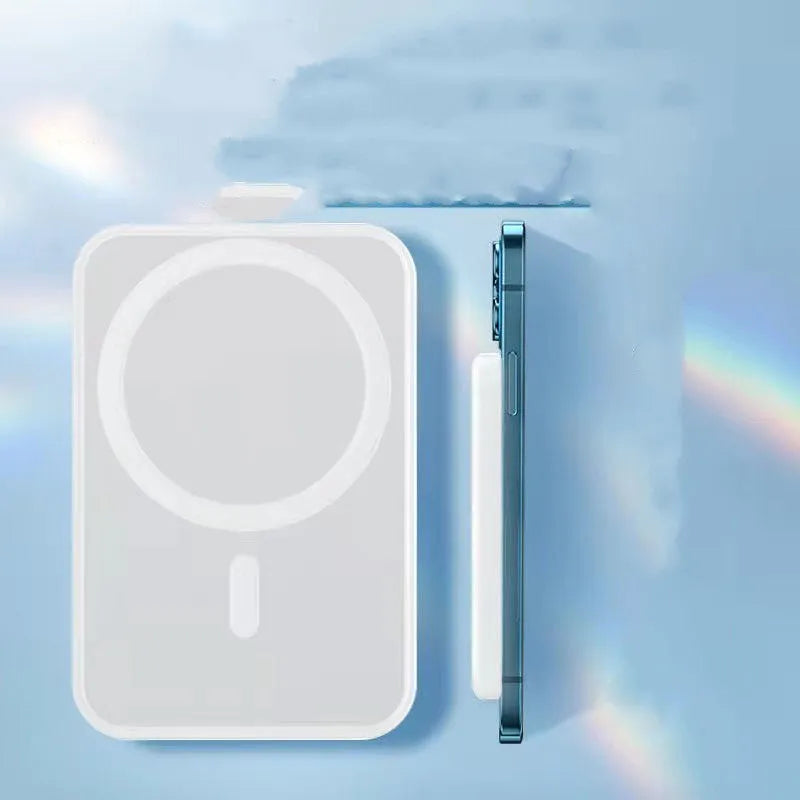 White foot-shaped portable power bank with magnetic wireless charger on a table.