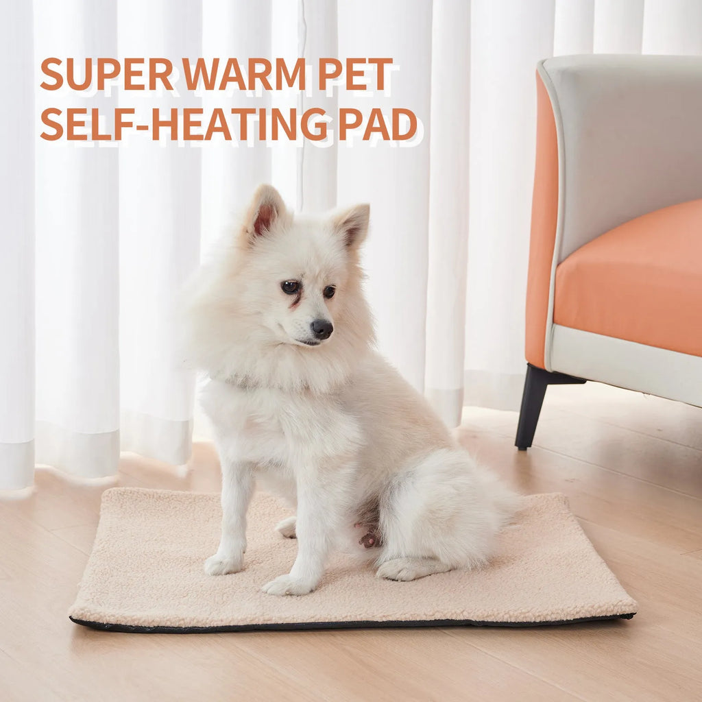 Grey self-heating plush pet pad for cats and dogs on a wooden floor