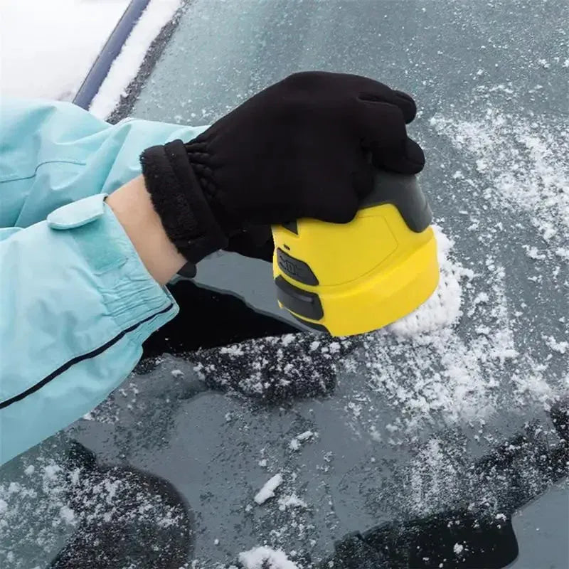 Yellow cordless electric ice scraper with funnel-shaped head next to a USB charging cable.
