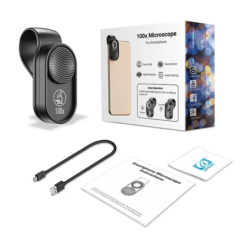 Black mobile magnification microscope with LED light clamped onto a smartphone, showing 100x magnification lens detail