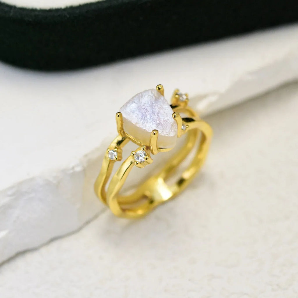 S925 sterling silver ring with irregular triangle shape, moonstone, and electroplated rose gold finish.