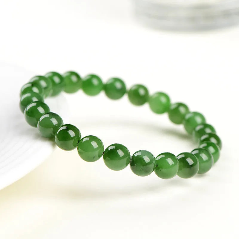 Natural jasper ball bracelet showing polished stone beads in one of five available sizes.