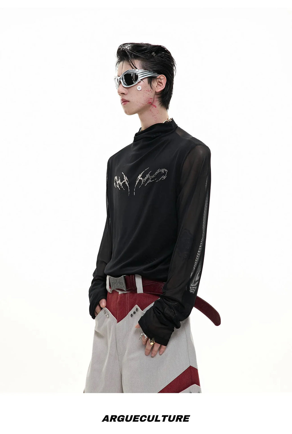 Black and white long sleeve mesh slim fit shirt laid flat, showing mesh fabric texture.