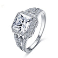 Platinum colour geometric women's ring with hollow design and inlaid zircon stone.
