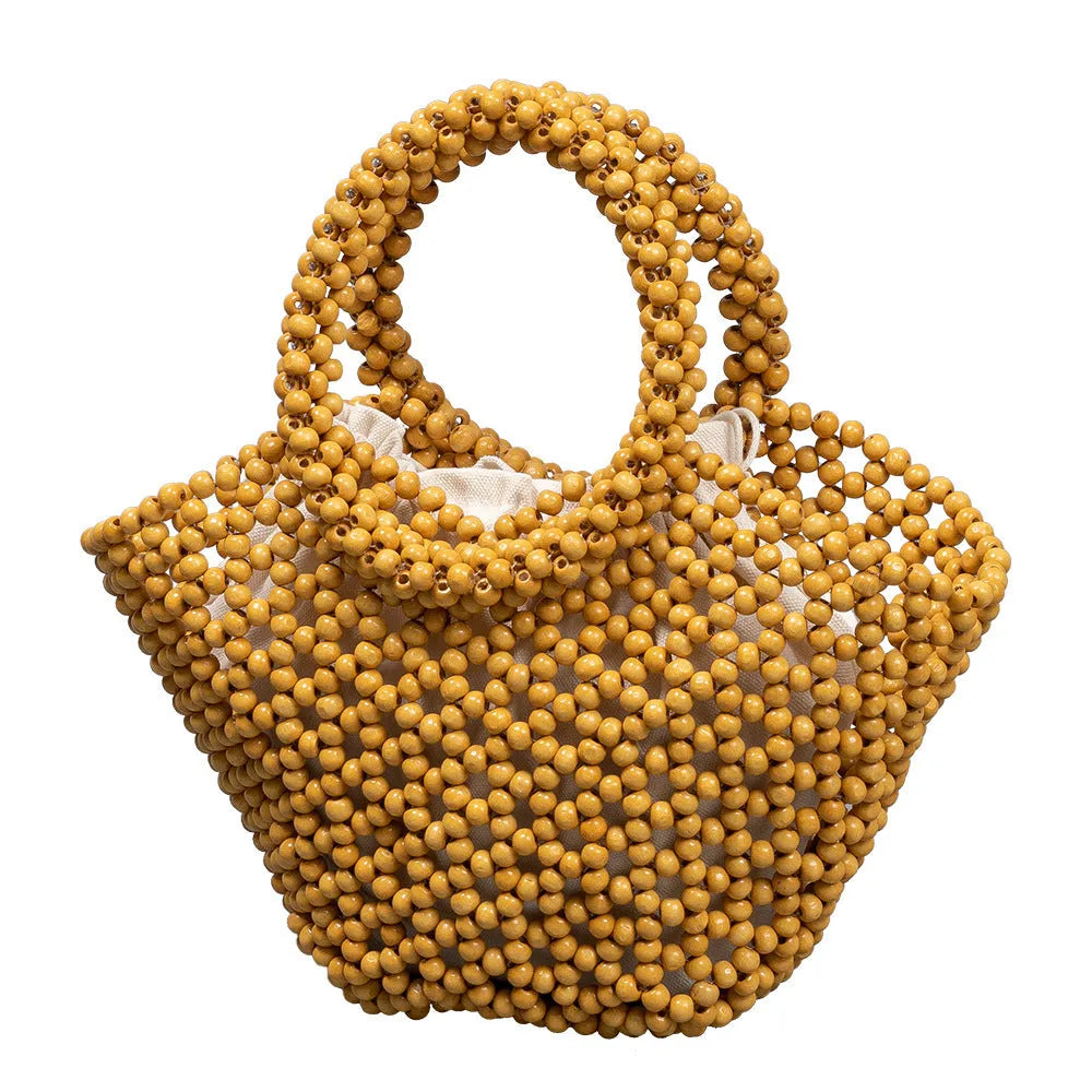 Maple wood hand-woven seaside handbag with wooden beads in dumpling shape