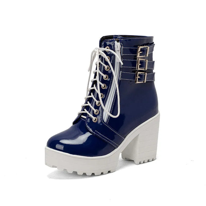 Women's black thick-heeled ankle boots with lace-up front and round toe on a waterproof platform