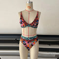 Women's high-waist floral print bikini swimsuit on a white background