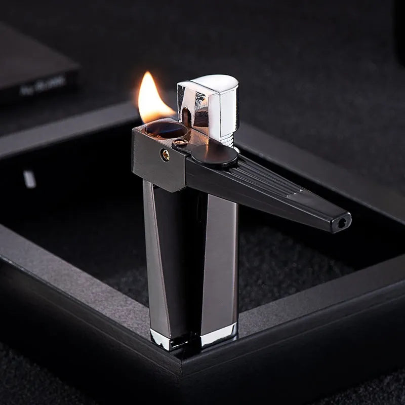 Silver foldable metal pipe lighter in open position showing flame mechanism and storage compartment.