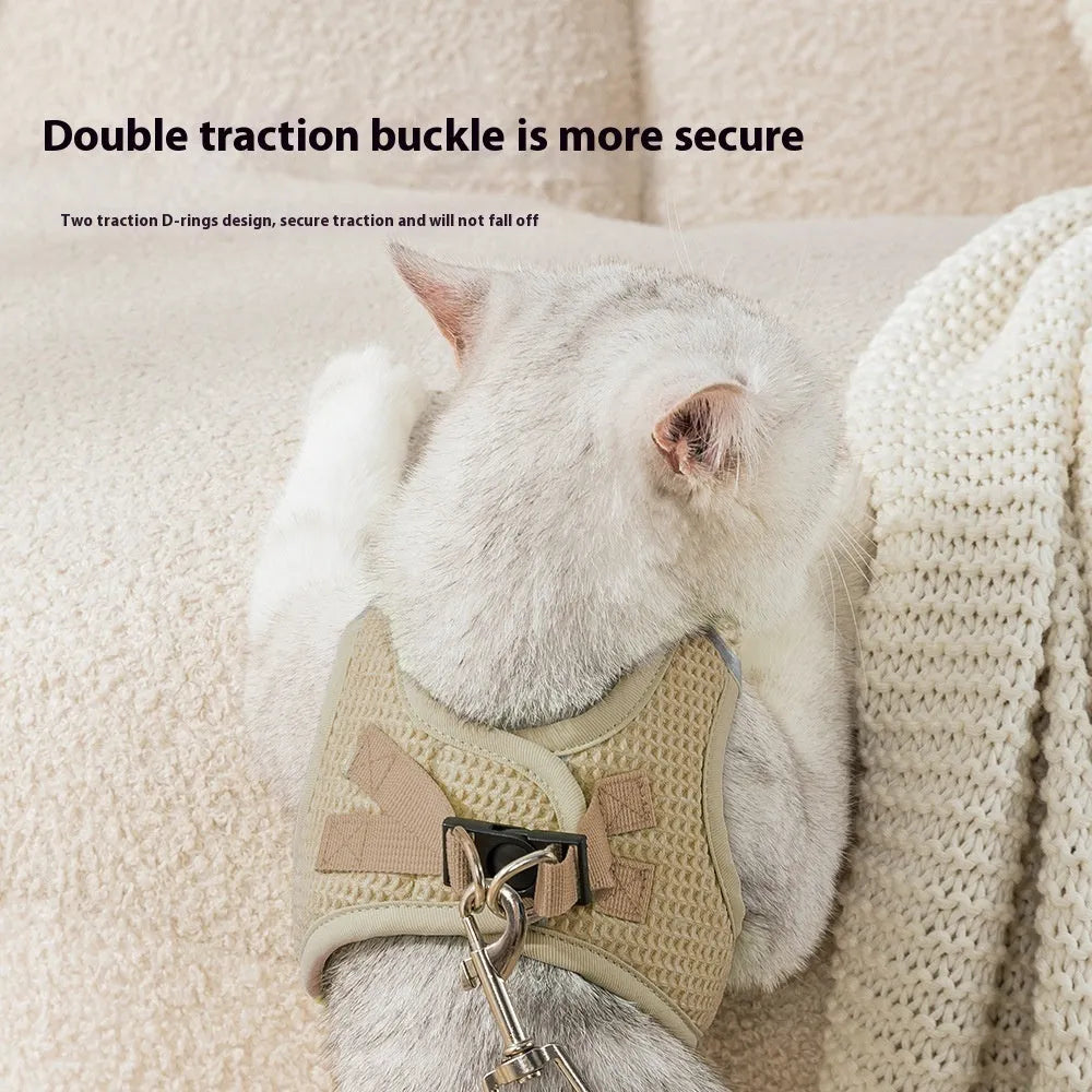 Brown waffle pattern cloth cat harness with hand holding rope chest strap
