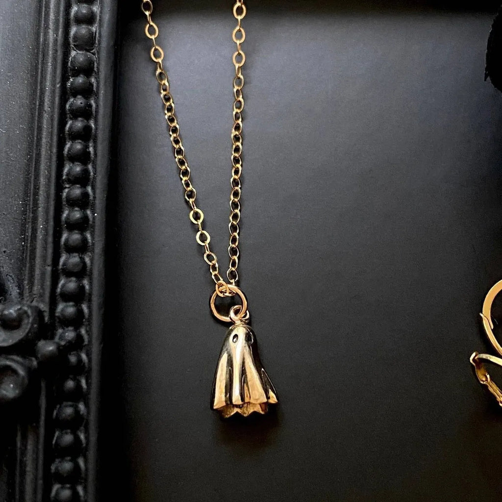 Stainless steel ghost pendant necklace with titanium steel detailing and twisted chain