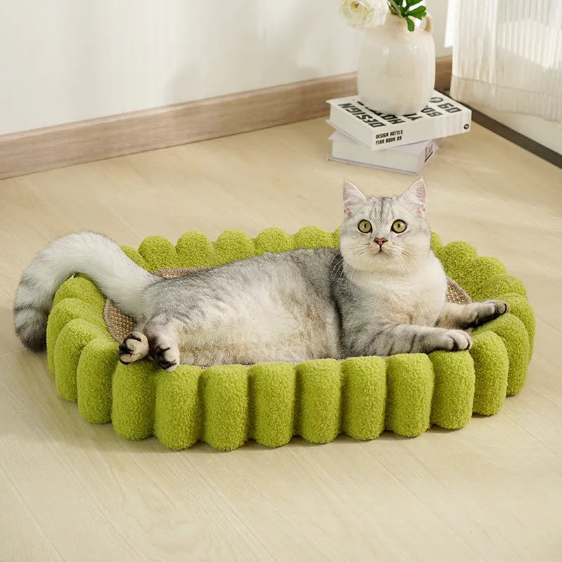 Green oval cat scratch pad bowl with sisal scratching surface and built-in cat bed