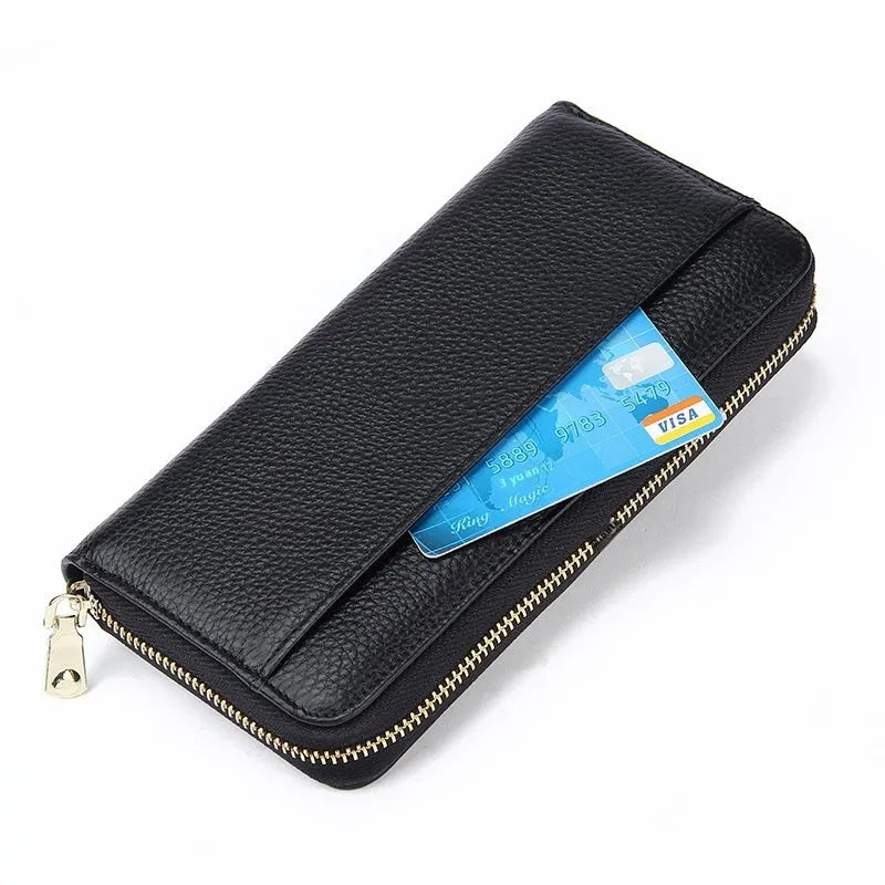 Long genuine leather women's wallet in solid colour with anti-theft card swiping feature