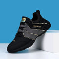Casual sneakers for teenagers with thick plastic sole and mesh lining in grey and black colour