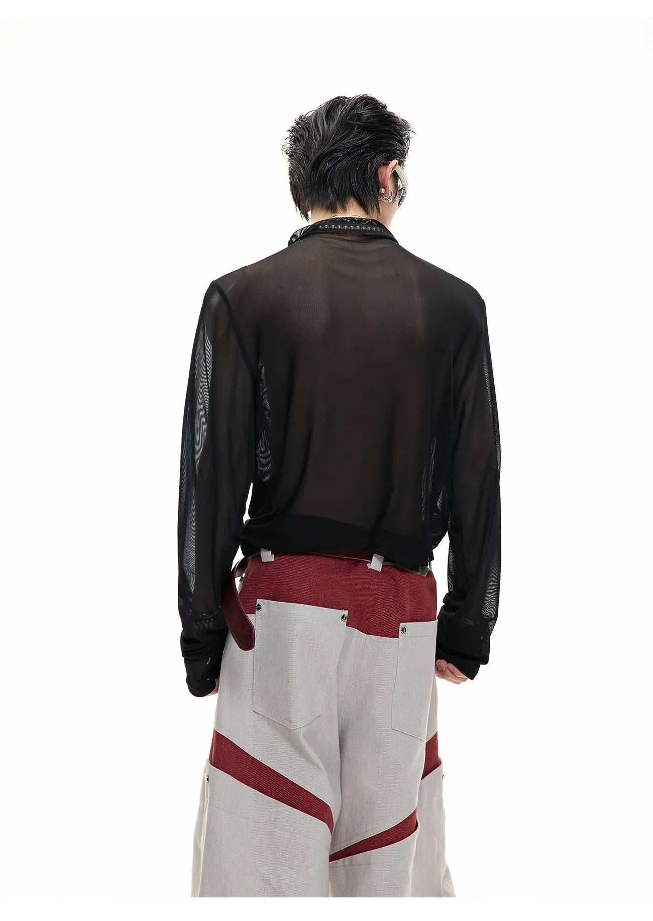 Black and white long sleeve mesh slim fit shirt laid flat, showing mesh fabric texture.
