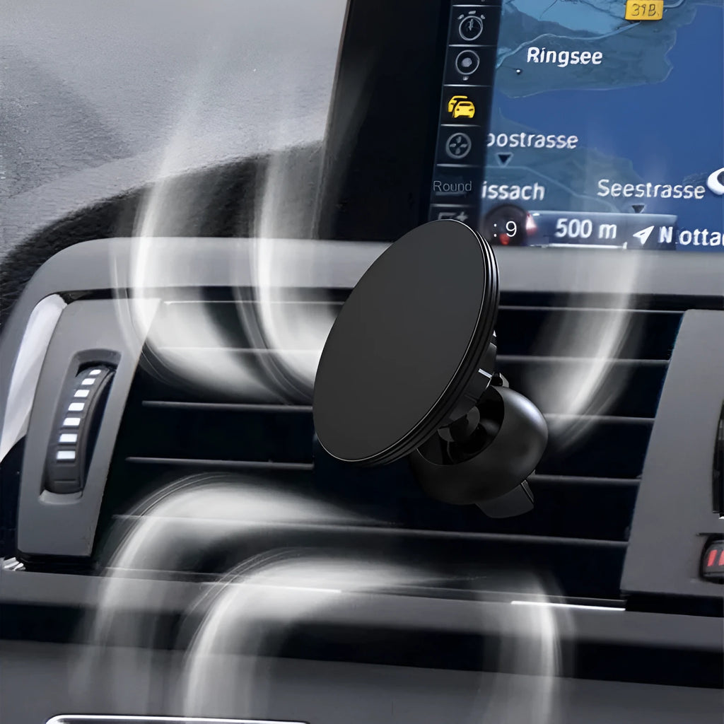 Black aluminium magnetic car air vent phone holder mounted on vehicle dashboard