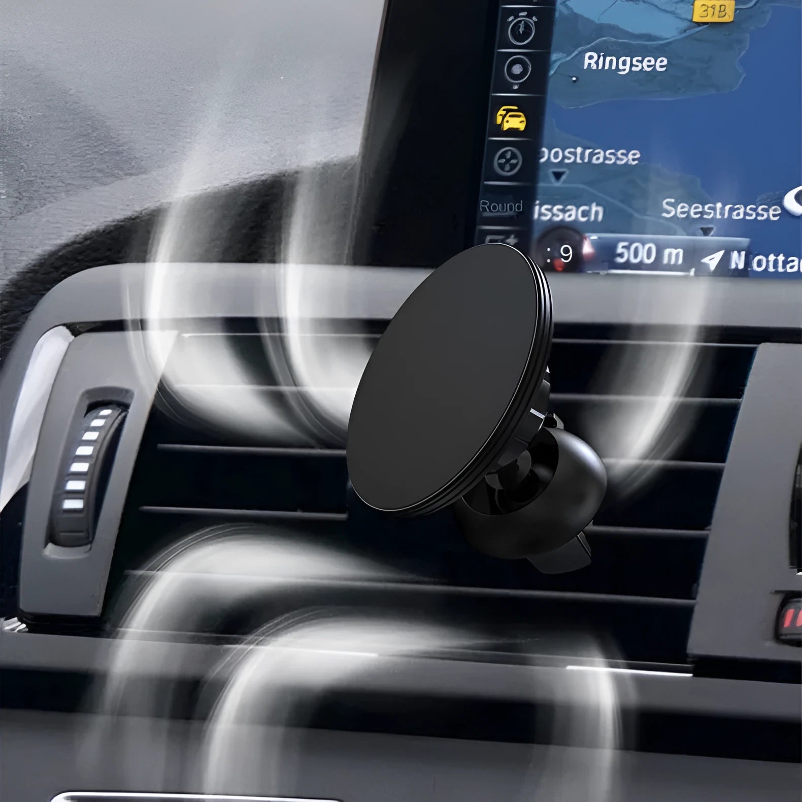Black aluminium magnetic car air vent phone holder mounted on vehicle dashboard