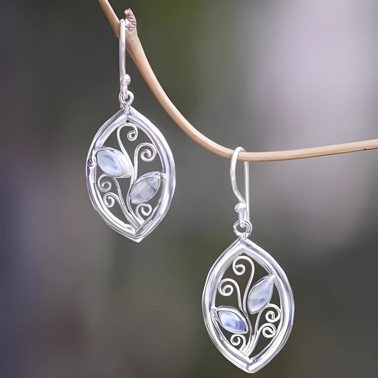 Silver leaf-shaped earrings with embedded colourful moonstone for women
