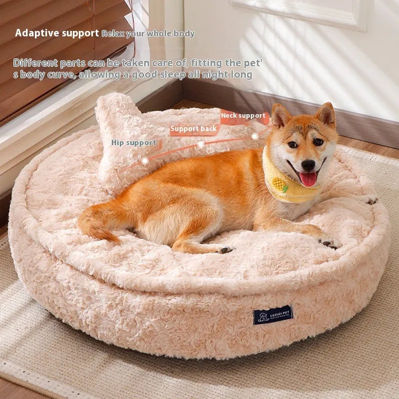 Round nest-style pet bed with a removable washable cover in a milk tea colour.