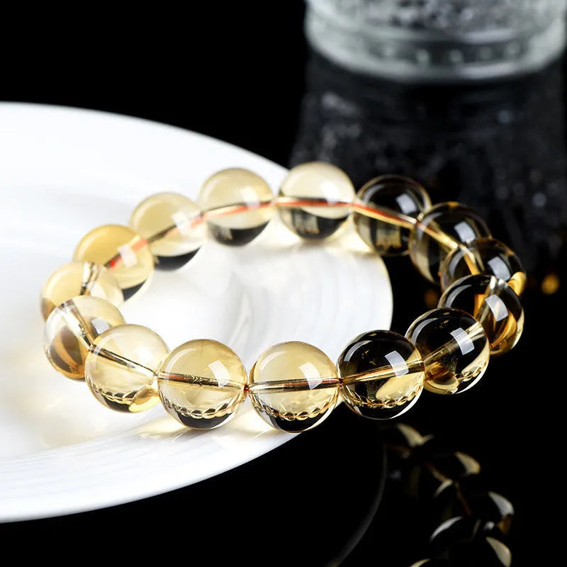 Natural citrine scattered beads ball bracelet showing polished beads on a bracelet base.
