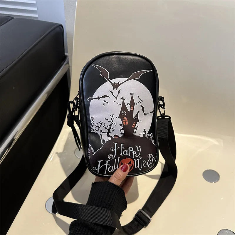 Halloween graffiti print mini crossbody bag with cartoon pumpkin ghost bat design in multiple colours.