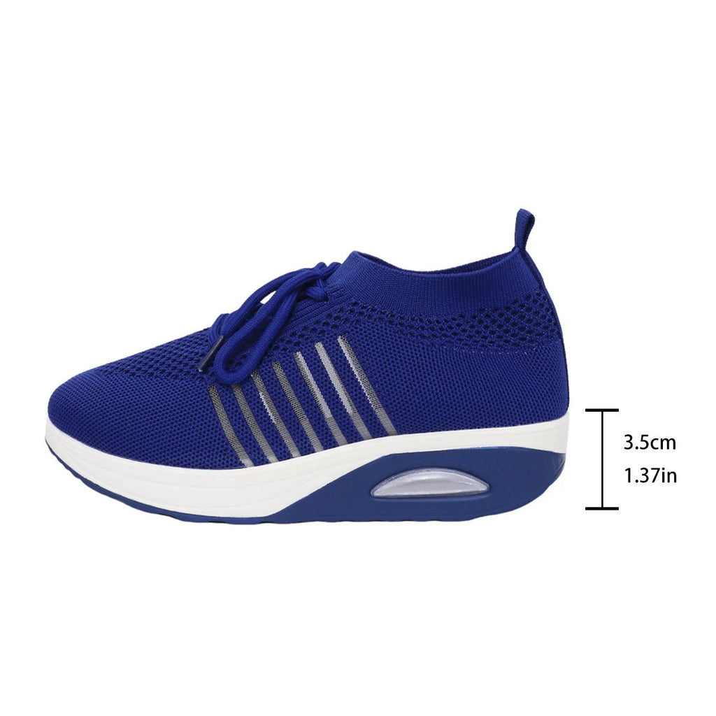 Women's lace-up slip-on wedge sports shoes in black with mesh upper and mid heel height increase