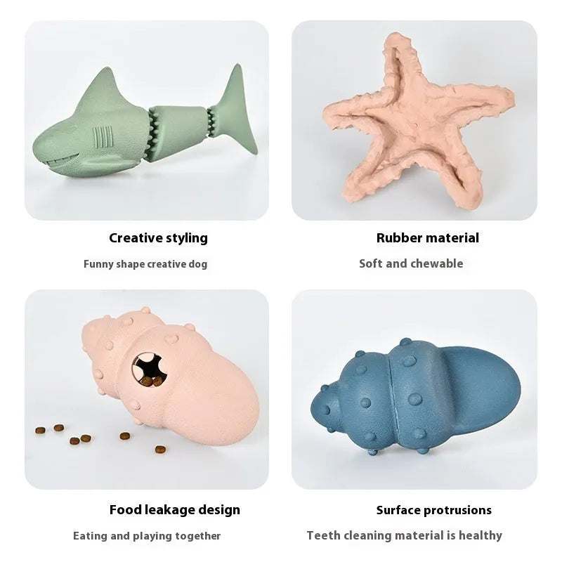 Blue and green shark-shaped rubber dog chew toy on a white background.