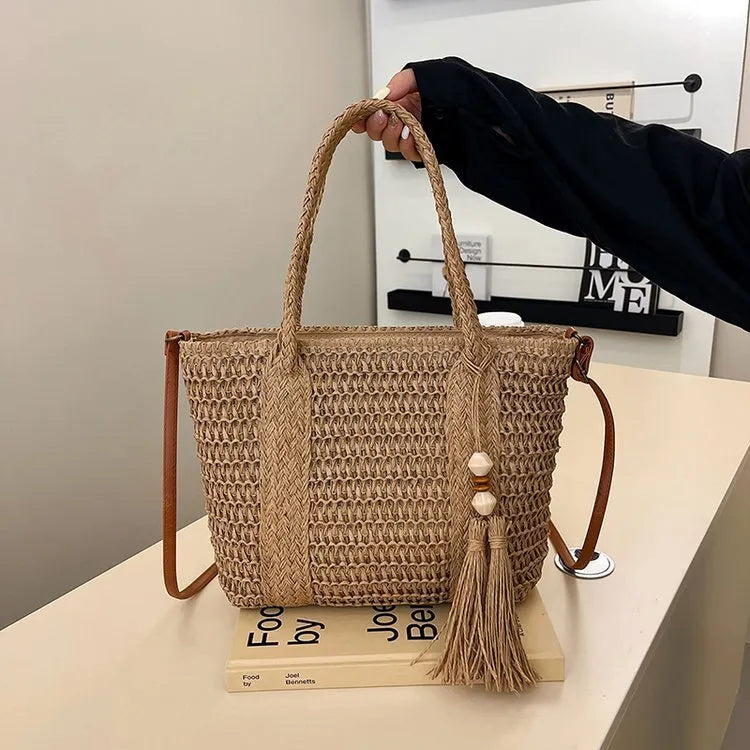Women's straw crossbody shoulder bag with woven texture in milky white colour showing large capacity interior