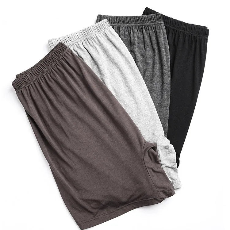 Men's solid colour high-waist boxer shorts in modal fabric, shown in multiple colours.