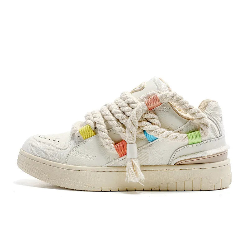 Creamy white retro skateboard shoes with lace-up front and platform rubber soles