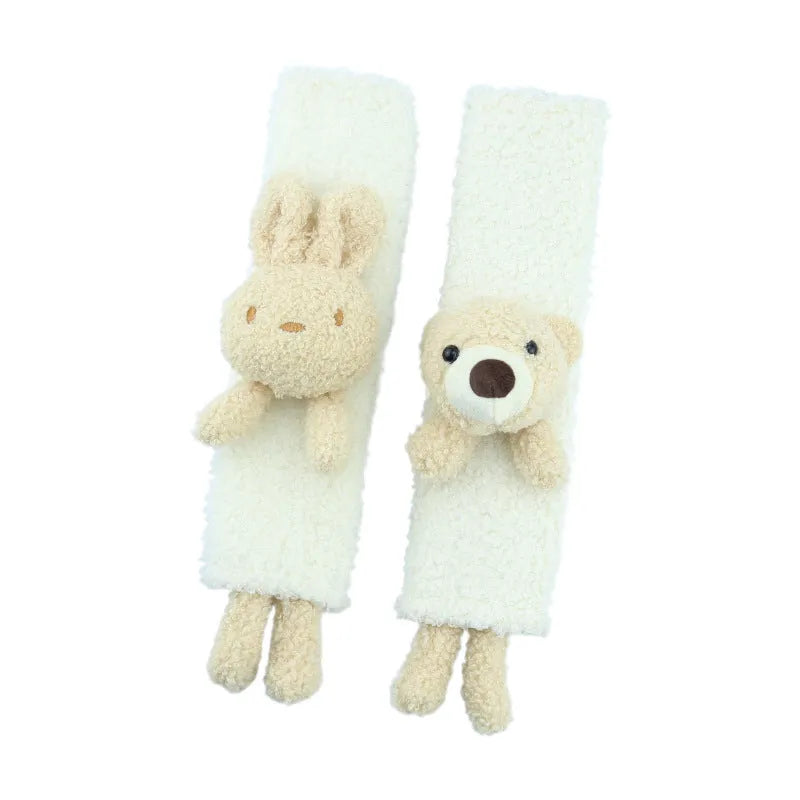 Cartoon plush car seat belt shoulder protector in lamb wool, showing rabbit and bear designs.
