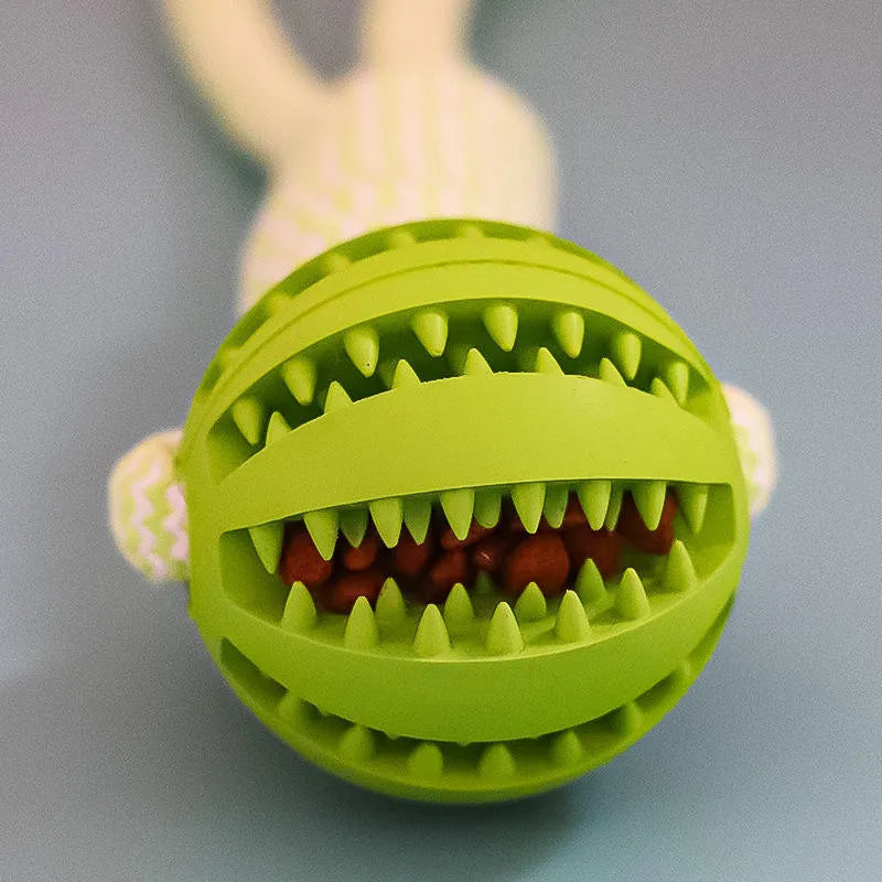 Interactive dog treat ball with hemp rope in blue for small dogs chewing and playing tug of war