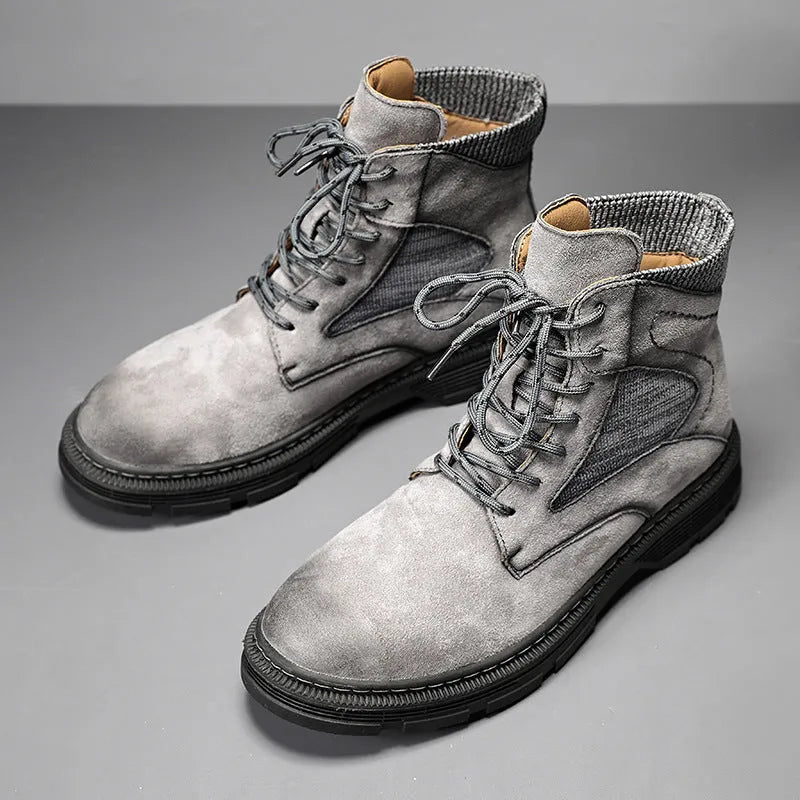 Men's vintage Martin boots in black with a round toe, low thick heel, and rubber sole.